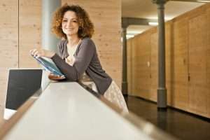 Businesswoman on counter in office