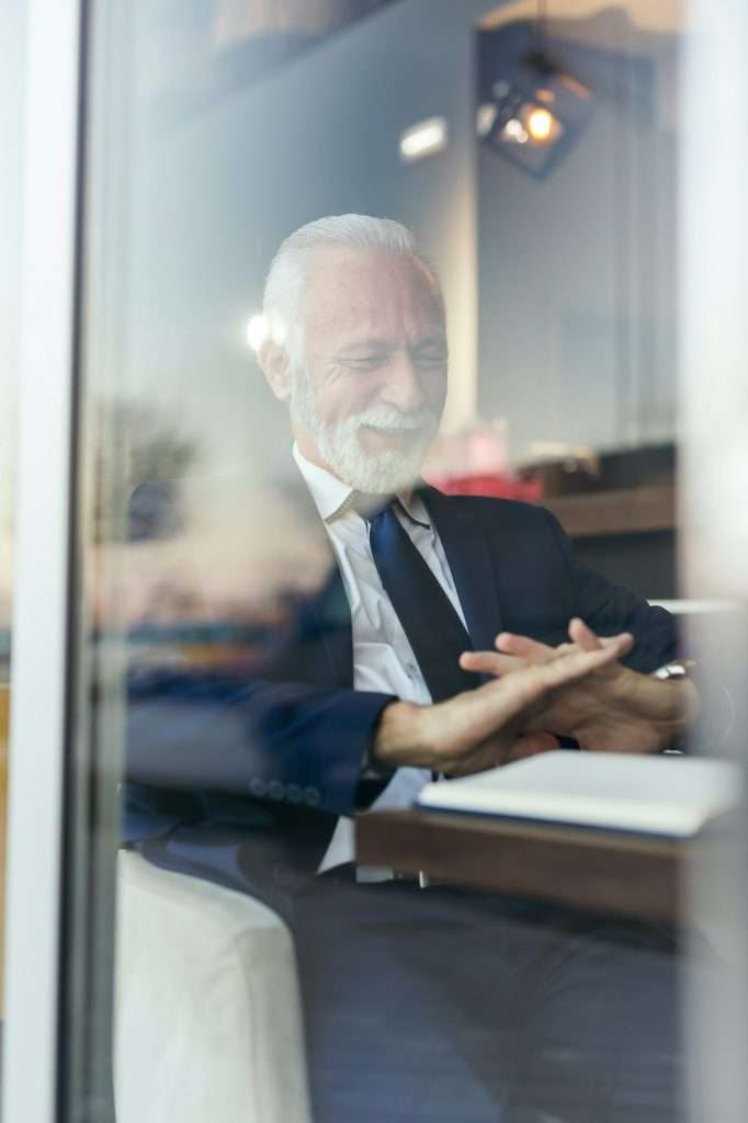 Senior businessman on business meeting