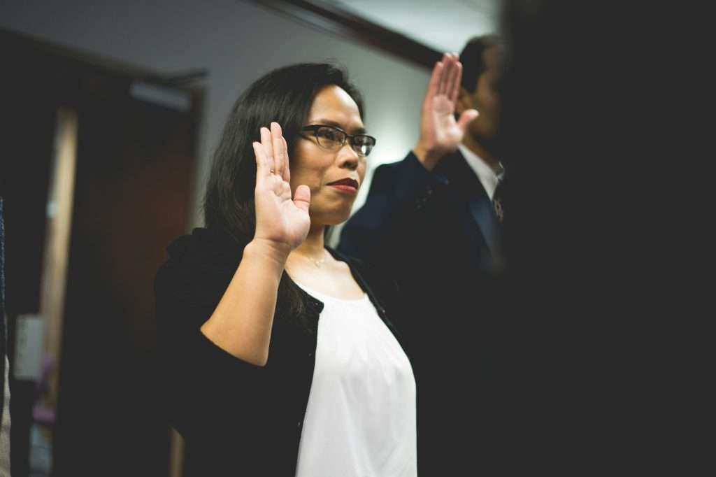Woman taking oath