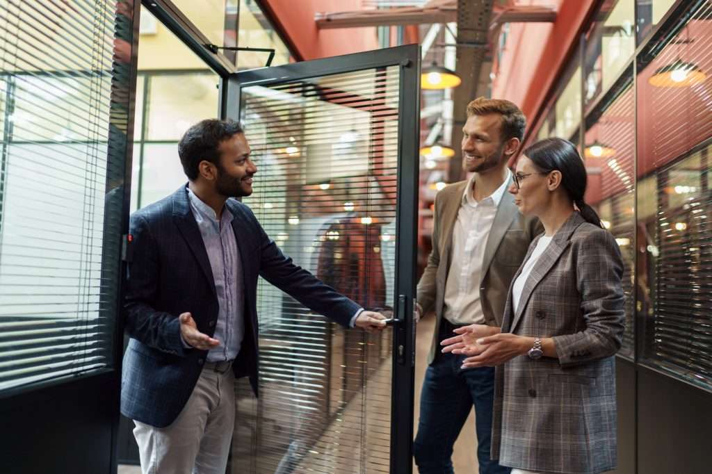 Indian Businessman invites partners to his office for negotiations