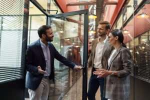 Indian Businessman invites partners to his office for negotiations